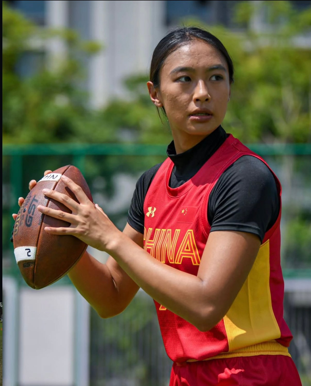 China national-team athlete preparing to pass